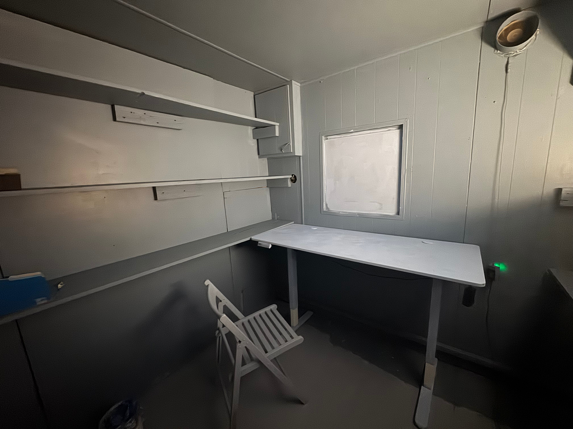 A freshly painted blue-gray room 